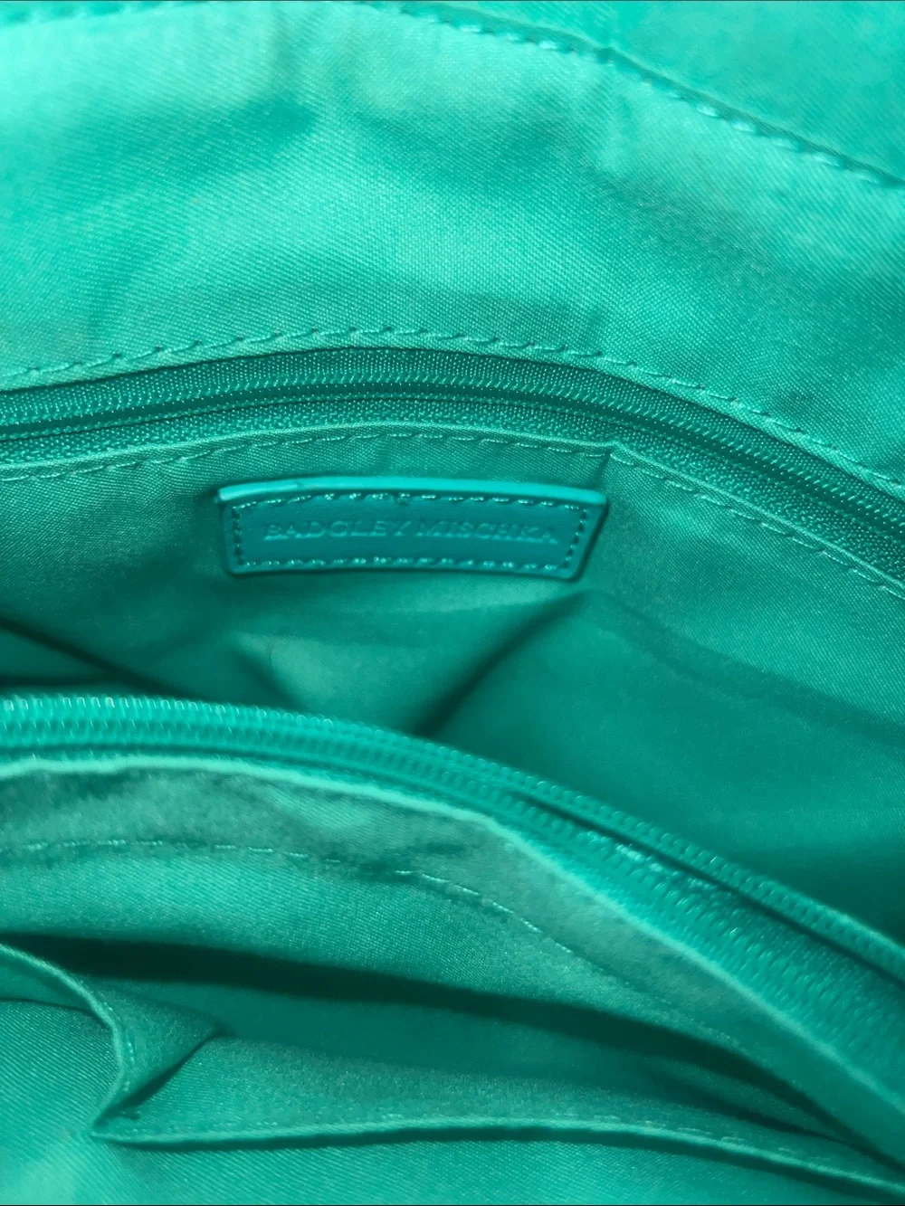 Badgley Mischka Chevron Quilted Shoulder Bag in a vibrant teal/mint green hue.